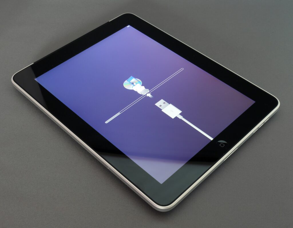 A smartphone and tablet displaying the same website, illustrating responsive design.